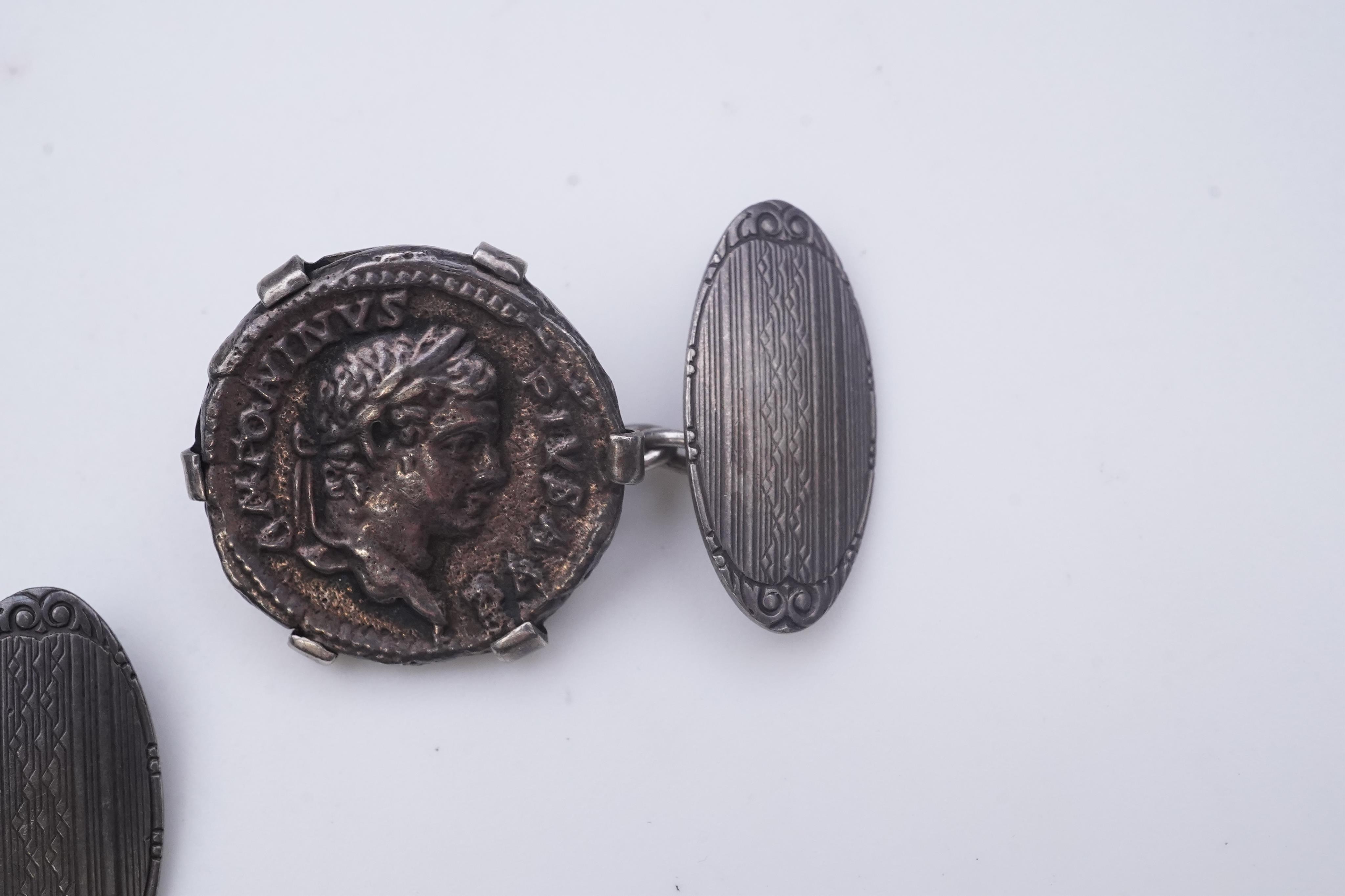 A pair of coin cufflinks